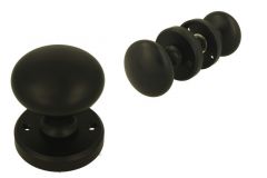 Knopstel rond messing zwart poedercoat met ronde rozetten