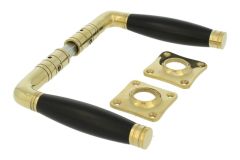 Deurklink (1926) ongelakt messing ebbenhout stel